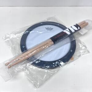 Remo Practice Drum Pad with Vic Firth 5A Drum Sticks